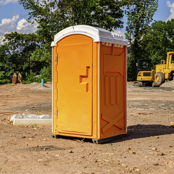 how often are the porta potties cleaned and serviced during a rental period in Dewey